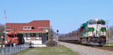 Green & Gold SOUTHERN power once again passes the depot at Spring City with Southbound varnish 