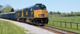 The outbound CSX Derby train passes through the horsefarms near Midway, Kentucky 
