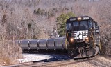 An old Dash-8 leads 50X South around the curve at CP Grove