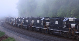 A string of GP38-2's with NS markings painted out, headed back to the leasing company