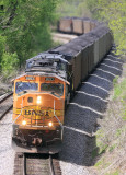 A BNSF SD70Mac leads NS 75J at West Waddy 
