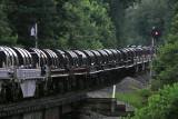 NS 60R stretches out through the dip at Salvisa as a light rain falls 
