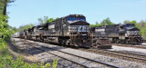 NS 111 passes a Bad Order D9 at West Waddy 