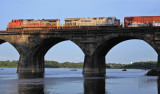 Old & New GEs lead a NS train East over the Rockville Bridge 