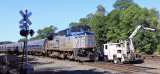 NS 04T, the eastbound Pennsylvanian, passes a NS track crew at Tyrone, PA