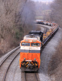 Eastbound 61R is not having any trouble climbing the West slope of Waddy hill with a short train of empty coil steel cars