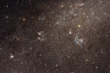 Clusters and nebulae in the LMC bar