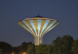Psychedelic water tower at night