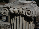 Fallen Ionic capital with representation of Bulls testicles