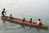 Children commuting by pirogue, Siphandon