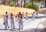 Heading home from school, Rostaq