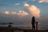 Local family strolling at sunset, Galle