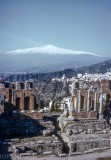 Mt Etna beyond the Roman ruins at Taormina, Sicity