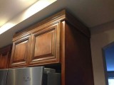 6.20.15_Cabinets over Fridg.jpg