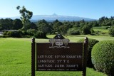 Mt Kenya is centered over the sign