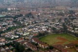 Flying out of Nairobi - thats Kibera towards the back with the flat roofs