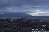 Evening view of Flores Is. (Ponta Delgada and Ponta de Albarnaz lighthouse) from the south-western shore of Corvo 