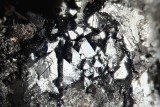 Hausmannite crystals (to 2 mm) with manganite on 10 cm matrix. Wyndham Mines, Bigrigg, West Cumberland Iron Field