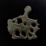 Horse and rider dagger chape in copper alloy, 32 x 30 mm, late Anglo-Saxon, 11th century. Found in Norfolk, UK.