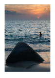 Joseph in the ocean, sundown, Phuket