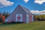 Canadian flag barn near Little River, NB
