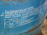 Toxic warning sign on barrel smoker