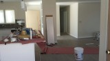 25. Looking into kitchen and living room from dining room