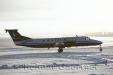 Airplane taking off from Barter Island LRRS airport snow covered runway Kaktovik Alaska