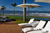 Deck chairs at a resort in Nuevo Vallarta with beach surf at Banderas Bay