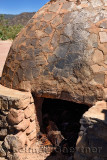 Stone oven for cooking agave hearts at a tequila factory Jelisco Mexico
