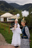 Traditional Shashu Kazakh greeting with candies at Huns village Kazakhstan