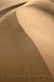 Abstract shapes and curves at Singing Sand Dune Altyn Emel National Park Kazakhstan