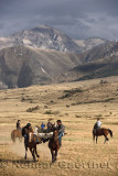 Horse riders struggling for possession of goat carcass in game of Kokpar Tudabarai in Aksu Zhabagly Kazakhstan