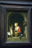 Gerard Dou - Femme accrochant un coq  sa fentre, dit aussi La Mnagre hollandaise (1650) - 8893