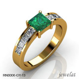 Emerald Gemstone Ring With 0.75 Carats Of Diamonds.