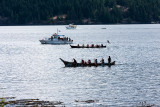 A flotila of Native Americans, some as far away as Coos Bay Oregon, arrive in traditional dug-out canoes.