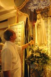 Mr. Danny Dolor before the image of Our Lady of Fatima