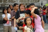 Pilgrims wait in line