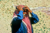 Moustachu Bedouin, Adjustint His Keffiyeh 