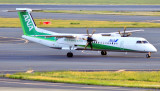 ANA Green At Sunset: DHC-8 JA857A