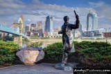 Downtown Cincinnati and the Roebling Suspension Bridge & Roebling statue