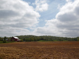 Cloud patterns over the farmhouse