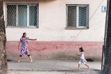 Girls walking in street - Tajikistan
