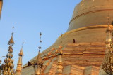 Monk taking a stroll on the stupa of Shwe Dagon