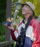 Birder Bob is elated that he attracted the birds by playing bird songs on his MP3 player. 