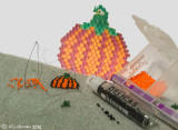 Pumpkin delica bead earrings in the making.jpg