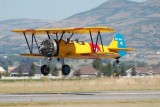 STEARMAN! I love the sound of a radial engine in the morning!  Two wings and string, with a round engine up front.