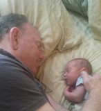 Papa takes up the slack on snoozing with the baby