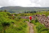 Along a stone wall