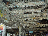 Thousands of dollar bills on the ceiling and walls at Willie Ts